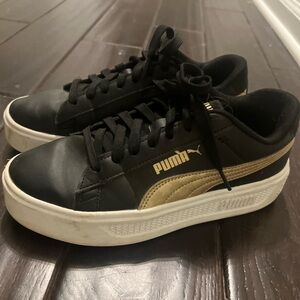 Puma Black Sneakers with Gold Detail